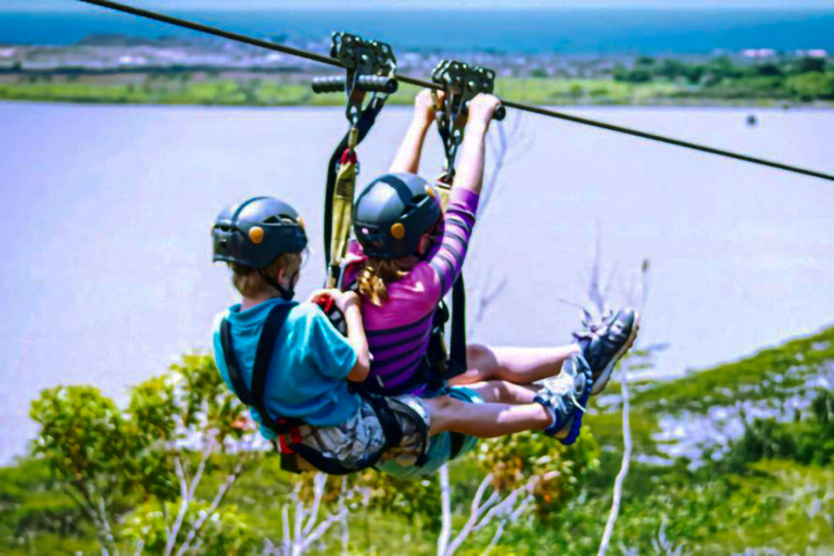 Two Kids Experience Tandem Zipping Koloa Zipline 