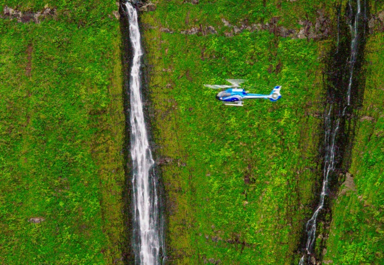 blue hawaiian complete maui helicopter tour fly over the waterfall