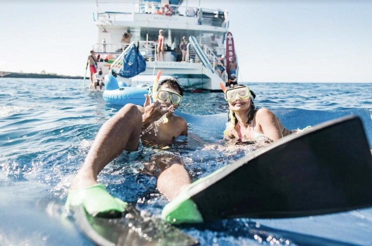 snorkel float on a tube lazily dive off the platform slide down the twenty foot water slide body glove hawaii