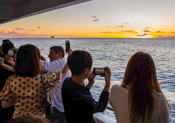 Star Of Honolulu People Taking Picture Sunset Slider