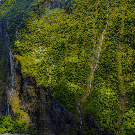Waterfalls Cascading Down Valley Walls And Vertical Sea Cliffs Molokai Hawaii Product