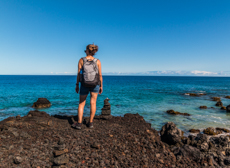 Girl Standing On Edge Of Anaeho Omalu Bay Big Island
